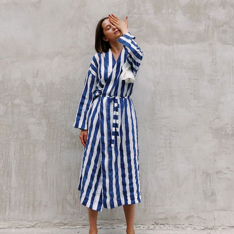 woman-in-blue-and-white-striped-dress-covering-her-left-eye-1182702 woman-in-blue-and-white-striped-dress-covering-her-left-eye-1182702